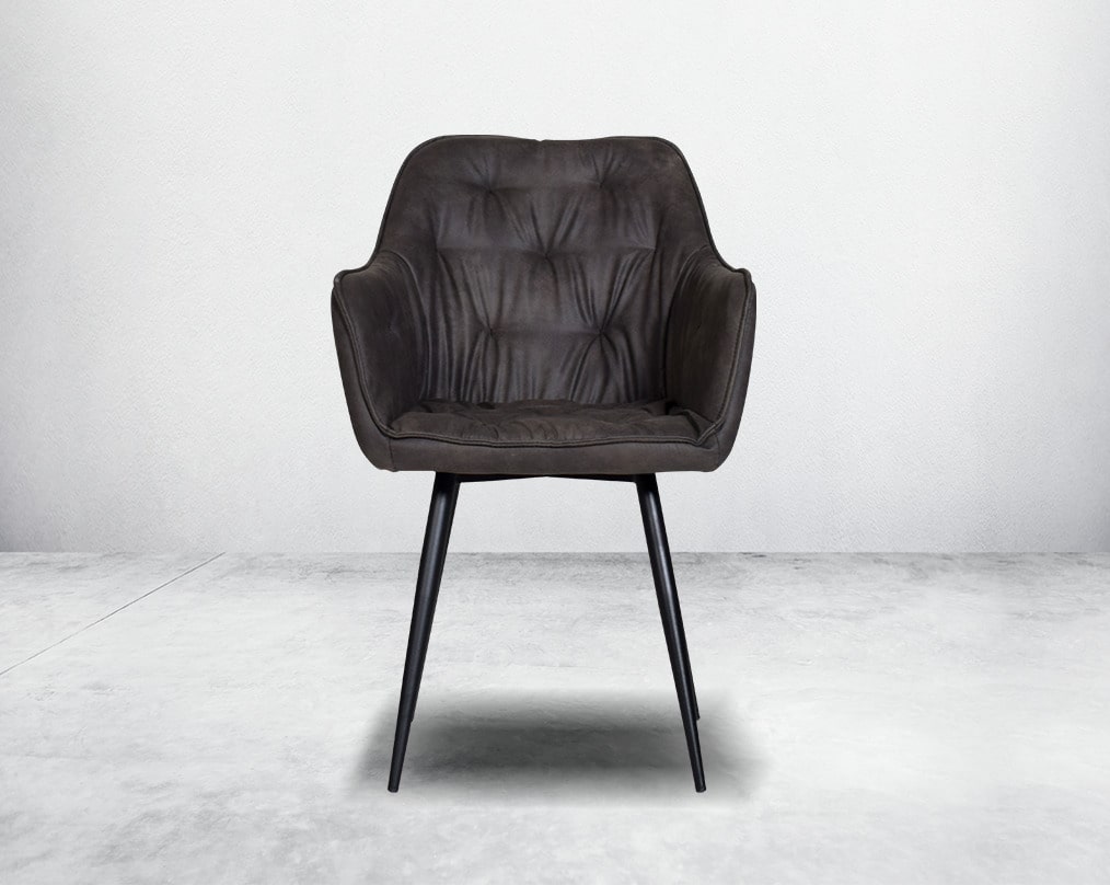 This soft, cushioned dining chair features an extraordinary contemporary design with tufted back and cushioned seat with metal legs front view