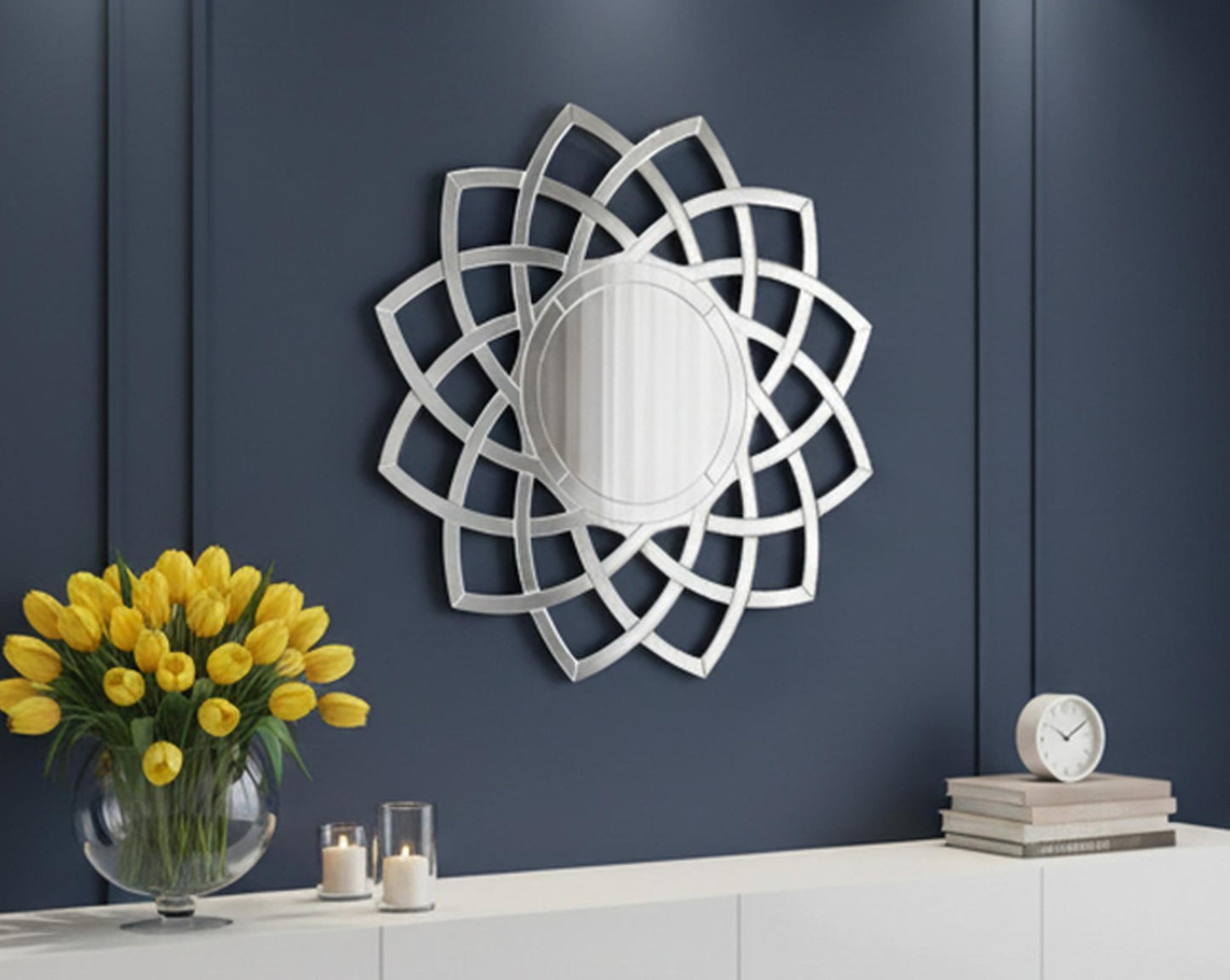 Wall mirror in a floral design motif is perfect to enhance any living or powder bathroom space with sliver colour