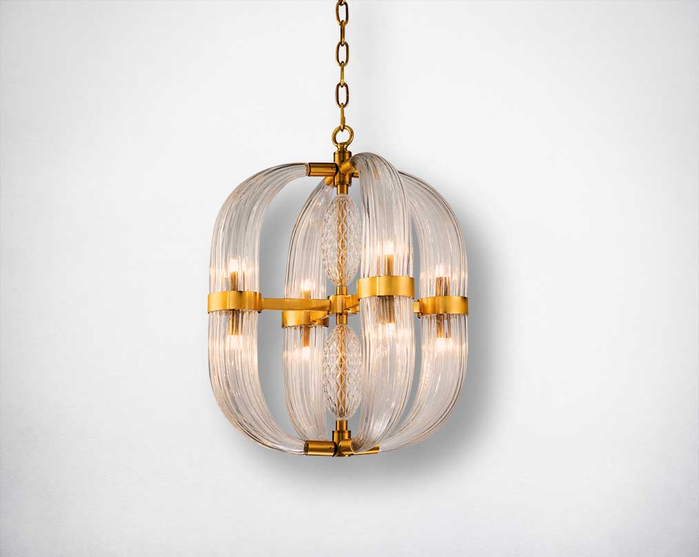 A traditional pendant light gets a glamorous upgrade in this four-light chandelier! Crafted of metal in brass finish, this fixture features an open orb frame composed of clear glass faceted prisms.