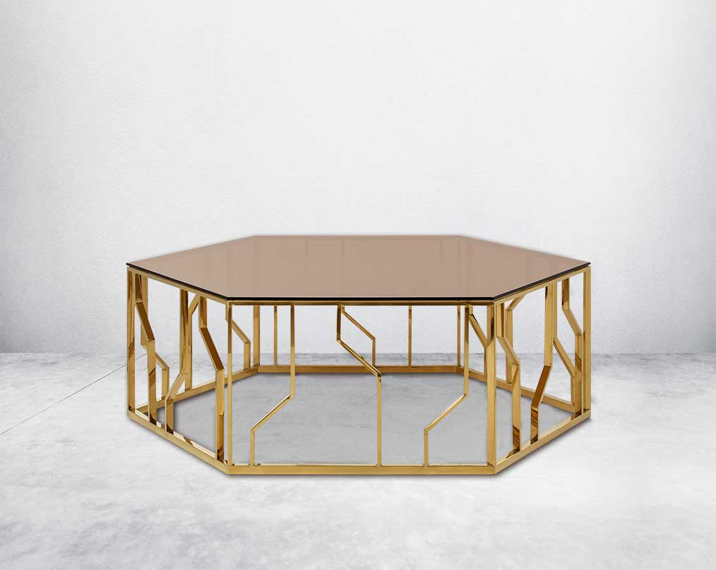 This elegant coffee table brings the metallic trend into the forefront with the gold finish on the stainless steel ornamented geometric base.