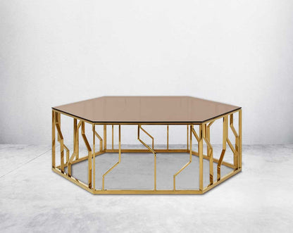 This elegant coffee table brings the metallic trend into the forefront with the gold finish on the stainless steel ornamented geometric base.