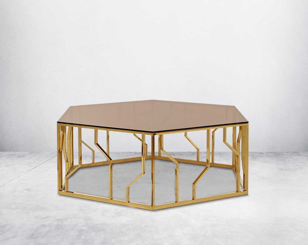 This elegant coffee table brings the metallic trend into the forefront with the gold finish on the stainless steel ornamented geometric base.