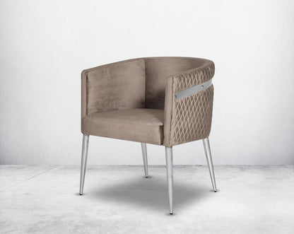 Accent leisure armchair upholstered & quilted in luxurious velvet fabric with high polished stainless steel frame and legs.