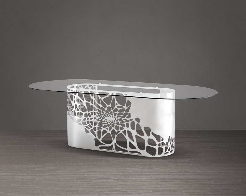 8 Seater Dining Table This exquisite & beautiful dining table with an artistic laser cut base in glossy stainless steel base with clear bevelled tempered glass top in a sumptuous style.