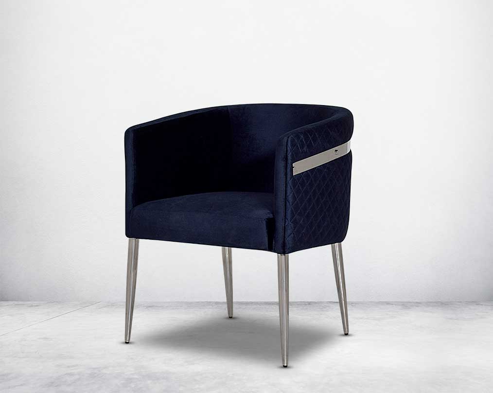 Accent leisure armchair upholstered & quilted in luxurious velvet fabric with high polished stainless steel frame and legs.