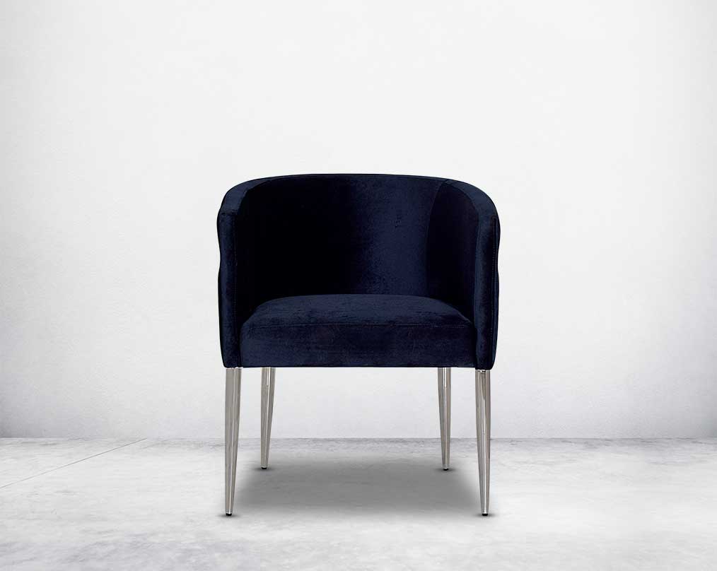Accent leisure front armchair upholstered & quilted in luxurious velvet fabric with high polished stainless steel frame and legs.