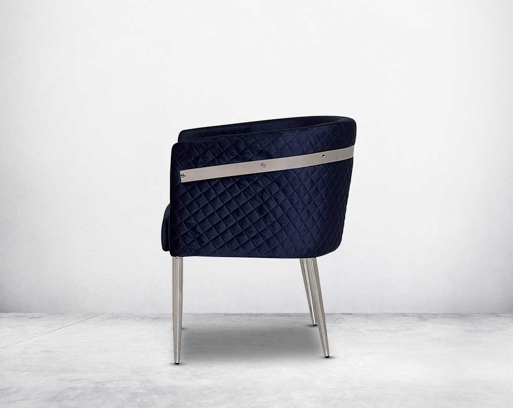 Accent leisure  back armchair upholstered & quilted in luxurious velvet fabric with high polished stainless steel frame and legs. 