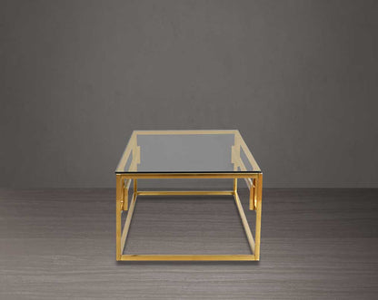 This tempered clear glass coffee table The table features an elegant and sophisticated design with a gold-plated stainless steel frame in a geometric contemporary design. back view 