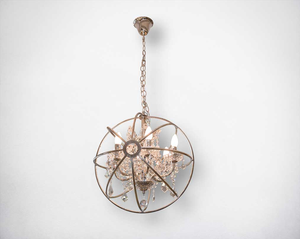 Pendant light with iron frame and crystal in cage motif in modern classic artful design.