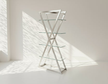 Defined by its essence this display unit relishes a premium look with its clear glass shelves seated on a vertically crisscross stainless steel frame. This is a majestic and elegant display unit which will bring a touch of class to your home.