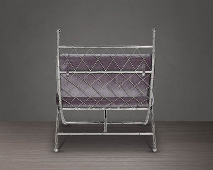 Lounge chair back with upholstered in fabric with high polished stainless steel frame in bamboo design.