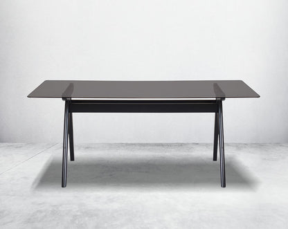 This elegant 6 seater rectangular style dining table in retro style comes with a black tinted tempered glass top & solid wooden geometrical base in dark walnut finish.