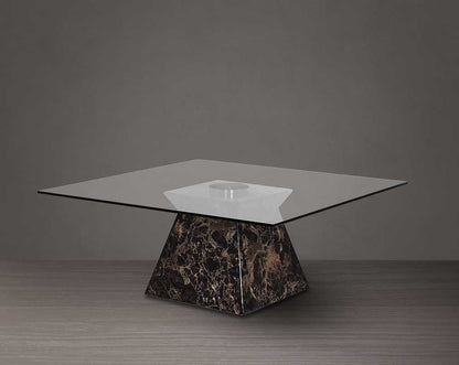 Square coffee table with clear glass top & brown imitation marble base in glossy finish.