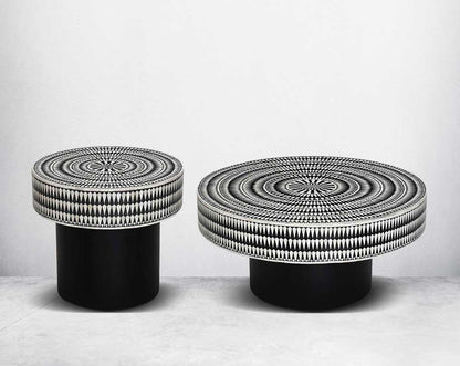 This gorgeous black and white inlay coffee & end table with a black metal base is a perfect statement piece in your living room.