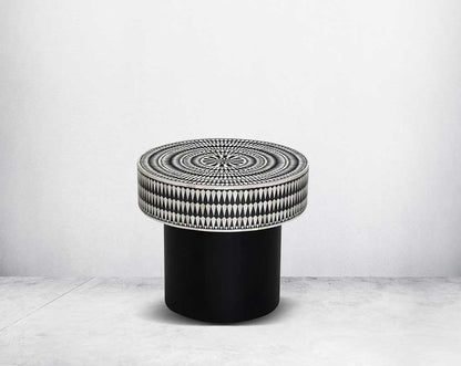 This gorgeous black and white inlay coffee & end table with a black metal base is a perfect statement piece in your living room.