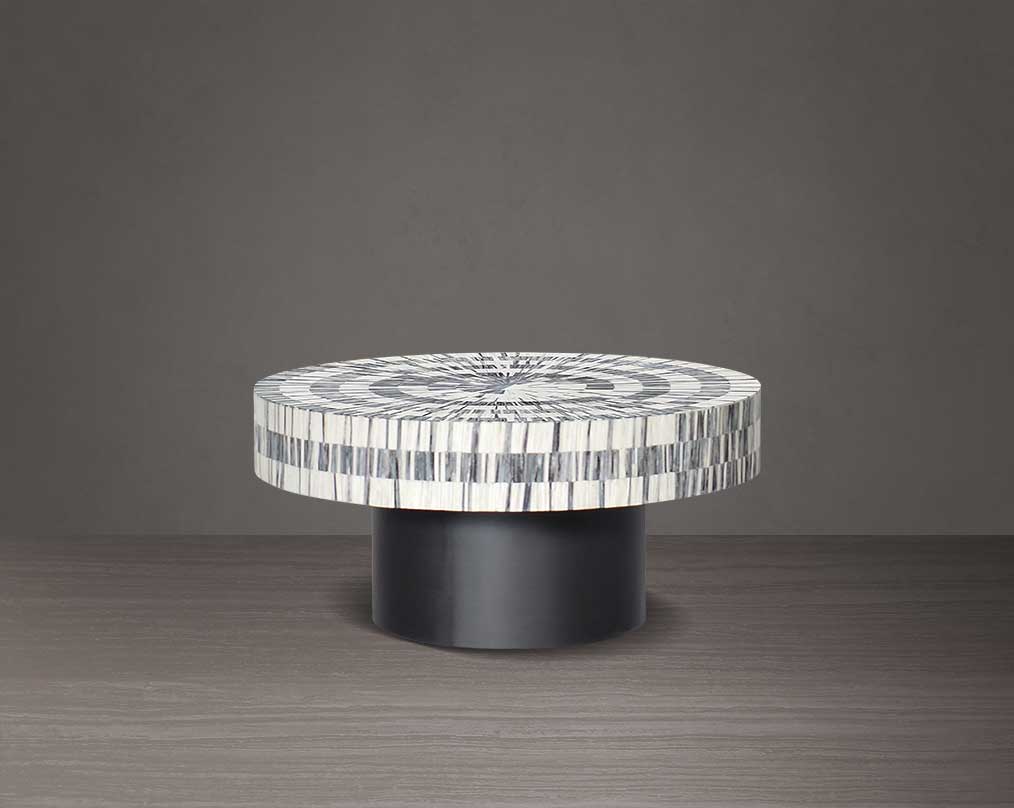 This gorgeous antique black and white inlay coffee table with a black metal base is a perfect statement piece in your living room - large