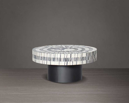 This gorgeous antique black and white inlay coffee table with a black metal base is a perfect statement piece in your living room - large