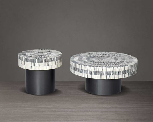 This gorgeous antique black and white inlay coffee and end table with a black metal base is a perfect statement piece in your living room.