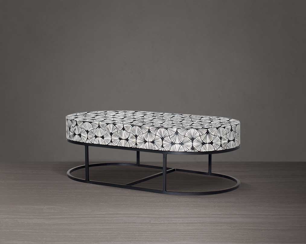 This gorgeous black and white inlay coffee and  in floral pattern with a black metal base is a perfect statement piece in your living room.