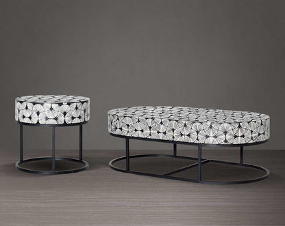 This gorgeous black and white inlay coffee table and end table in floral pattern with a black metal base is a perfect statement piece in your living room. It is a masterwork in inlay in an elaborate pattern.