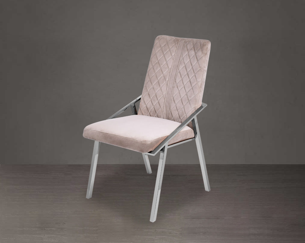 Dining chair upholstered in fabric with stainless steel legs.