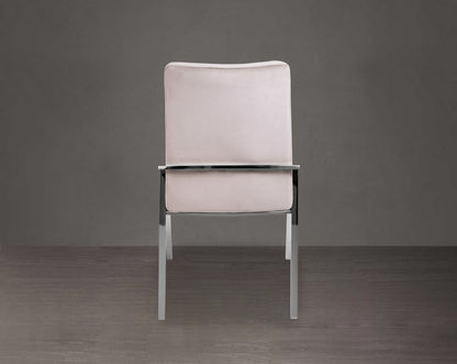 Dining chair upholstered in fabric with back view stainless steel legs.