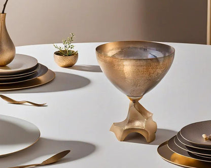 Decorative bowl in champagne glass and antique gold aluminium base with table