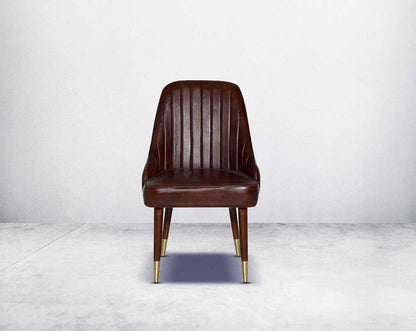 This rich contemporary dining chair in genuine leather makes for a luxurious dining experience It comes with a quilted cushioned back in acacia wood with metal splayed legs.