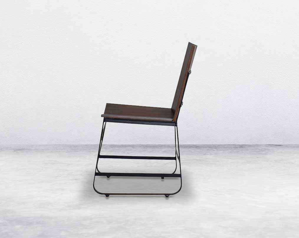 This sleek straight wooden dining chair in dark walnut finish & black coated metal base in minimalistic design
