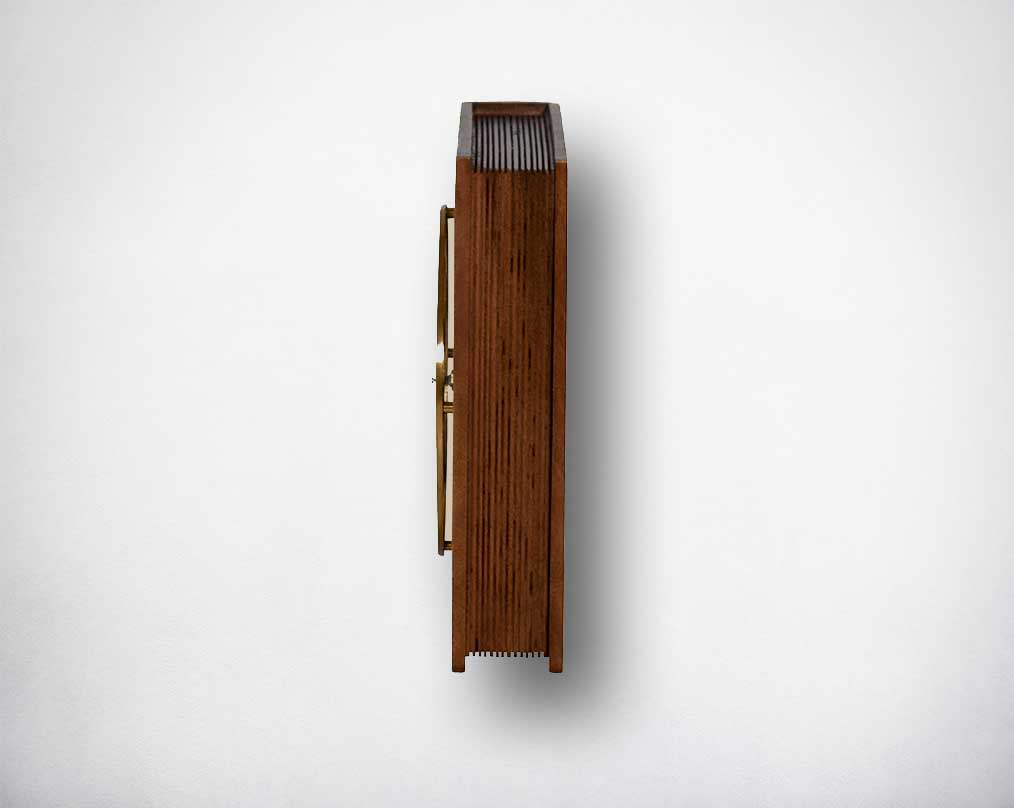 Table clock in antique matt brass and natural wood finish.