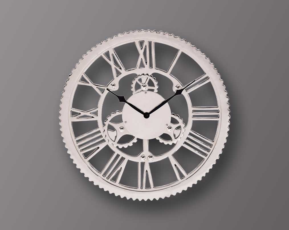 Round wall clock in nickel with roman numerals.