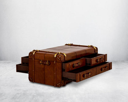 Coffee table in distressed cognac leather in a vintage look with open  6 drawers with leather handles, in trunk design.