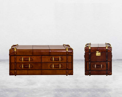 Coffee table in distressed cognac leather in a vintage look with brass hardware and wooden slats front view