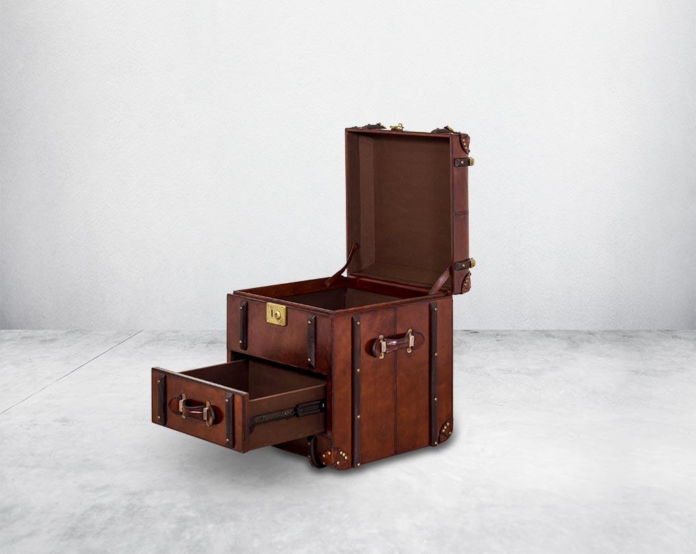 Coffee table in distressed cognac leather in a vintage open 1 drawer look It comes with storage and 1 drawer in trunk design.