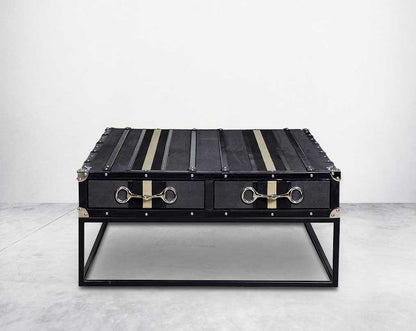 This coffee table inspired by the vintage trunk design motif makes a true focal point in any in modern, contemporary or eclectic decor front view 