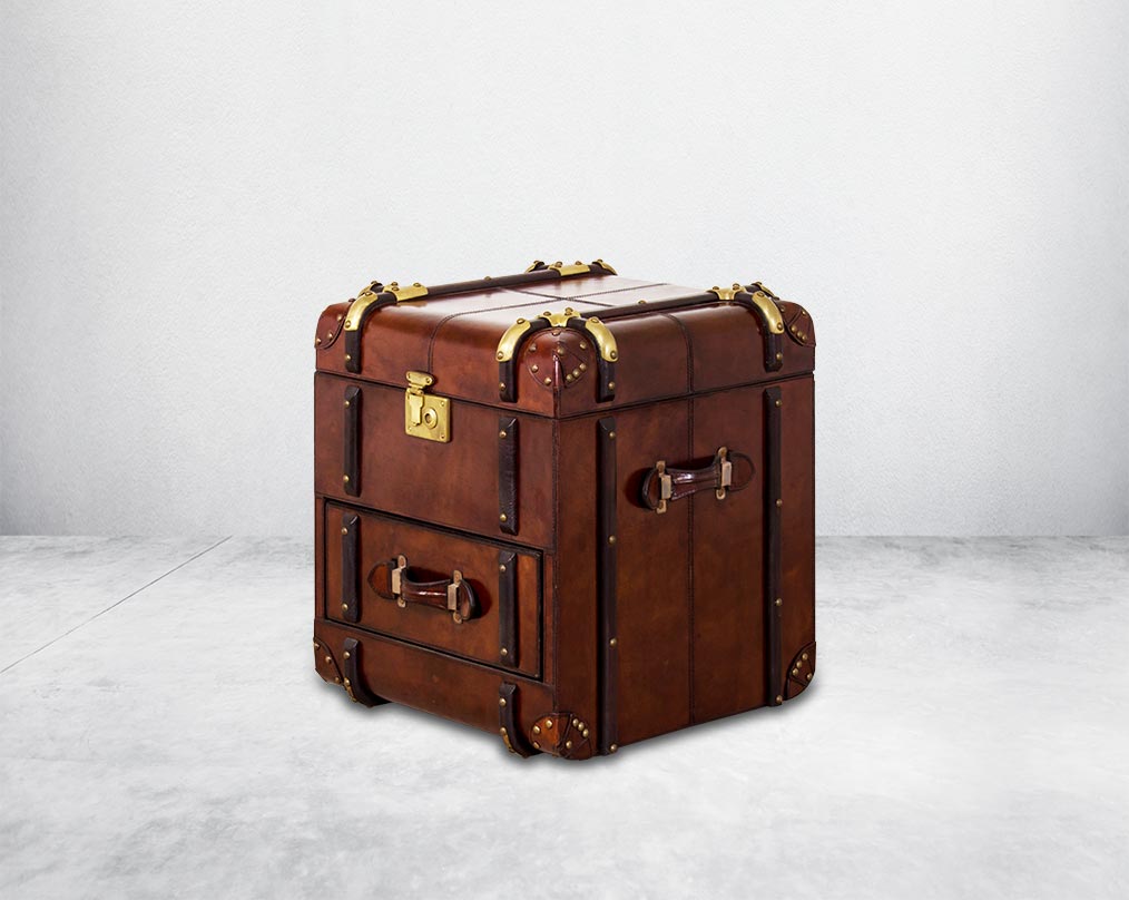 End table in distressed cognac leather in a vintage look with storage and 1 drawer in trunk design.