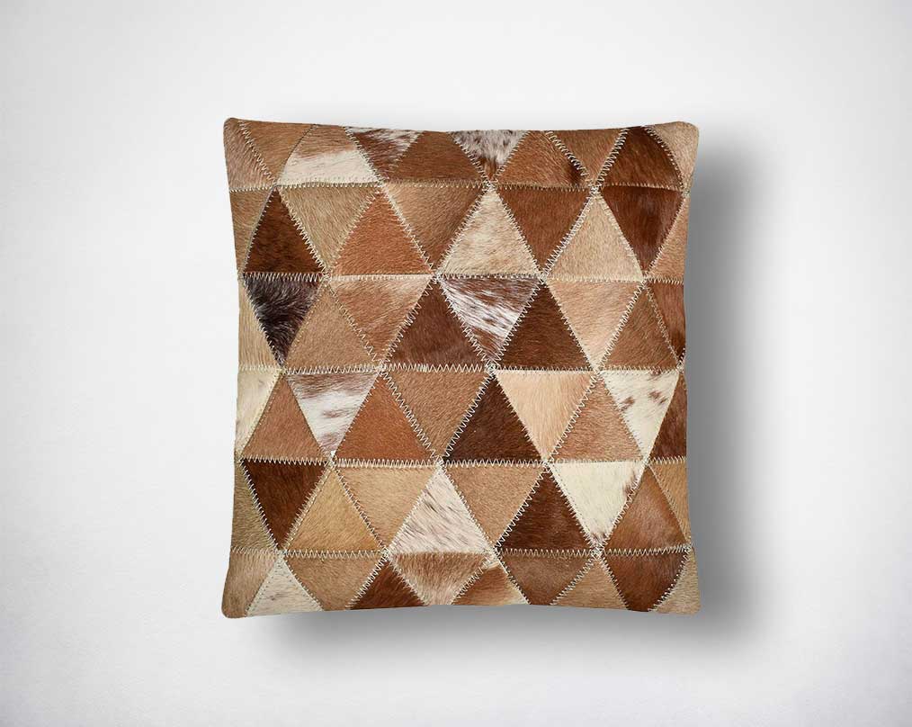 Brown and tan hair on the leather cushion.