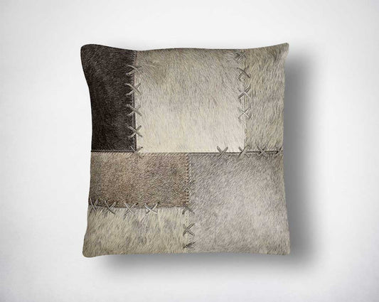 Grey hair on a leather cushion.