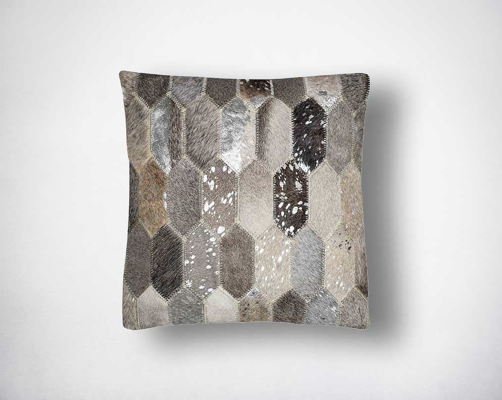 Grey and silver hair on the leather cushion.