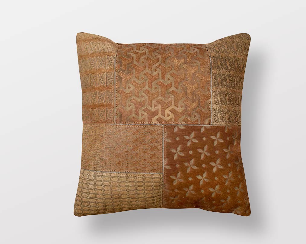 Tan hair on a leather cushion.
