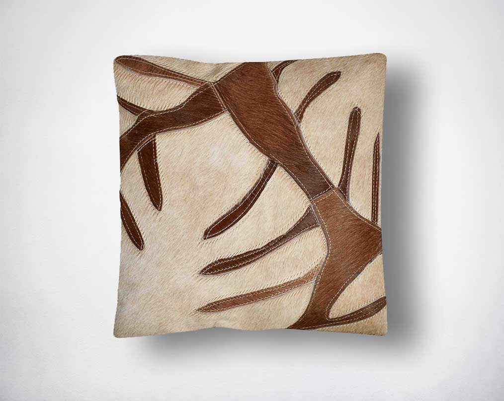 Beige and tan hair on the leather cushion.