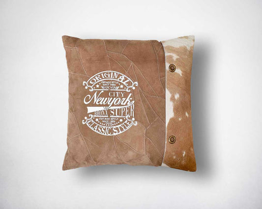 Camel & brown recycled suede & hair on leather cushion with print & embellishments.