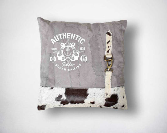 Grey & black recycled suede leather & hair on cushion with embellishments.