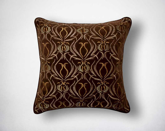 Brown and antique gold poly silk embroidered cushion.