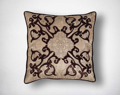 Dark brown and cream poly silk embroidered cushion.