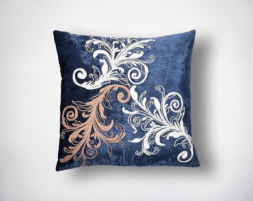 Blue & white embroidered poly silk cushion.