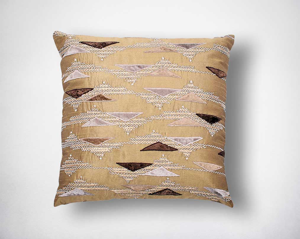 Light olive green embroidered poly silk cushion.