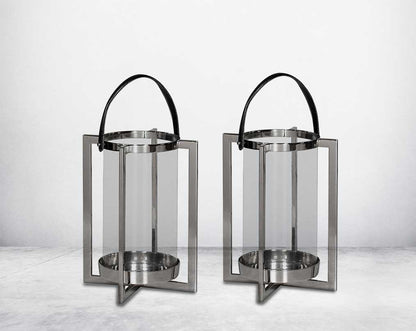 this lantern A master of reimagining classic forms, solid sheet metal frames feature broad panels of clear glass in a circular design