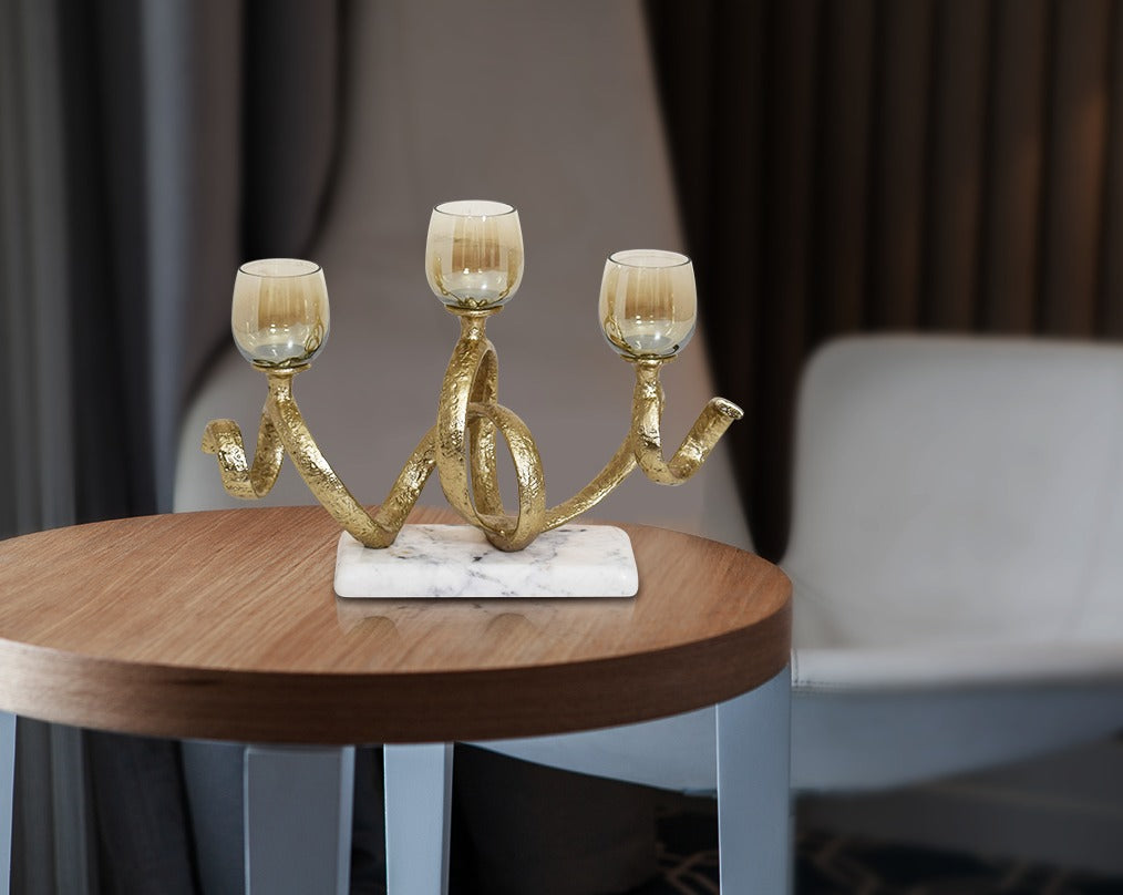 Multi T-light candle holder in gold-finished nickel plated aluminum, smoke luster glass with white marble base with table