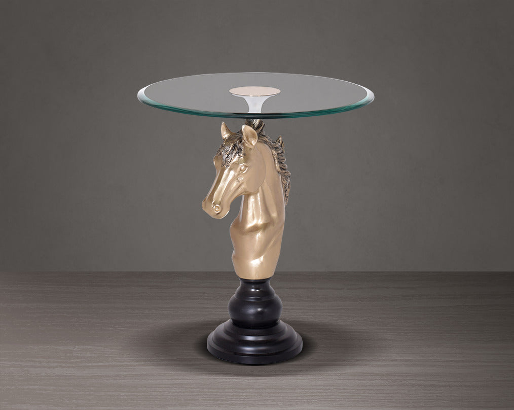 This vintage end table in gold finish aluminium base with horse head design motif with front view